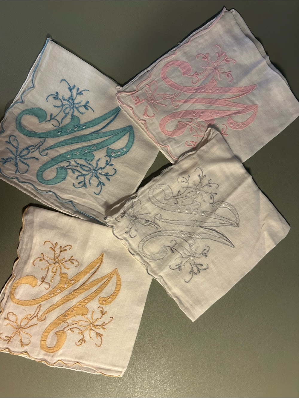 Four Vintage “M” monogrammed hankies.